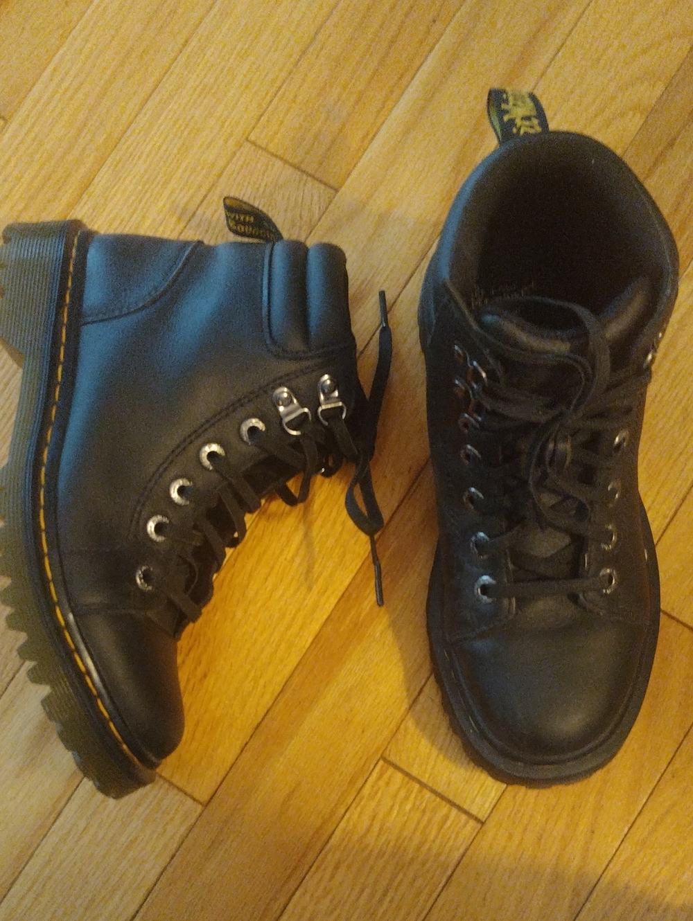 Dr. Martens Faora Black Leather Lace-Up Combat Boots with Yellow Stitching